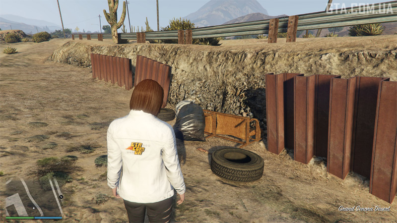 Clue #2. The hand of a buried corpse near the Sandy Shores Airfield in the Grand Senora Desert.