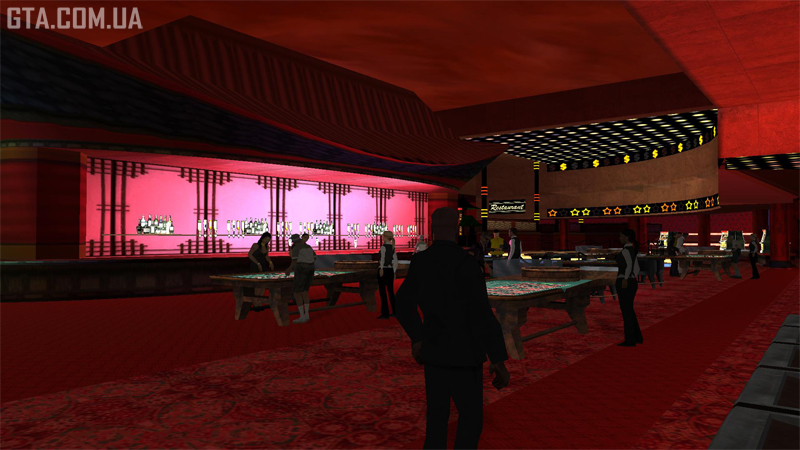 Inside the Four Dragons Casino. Bar and gaming tables.