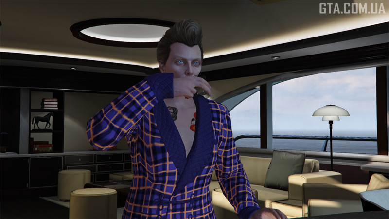 Яскравий жакет у клітинку.