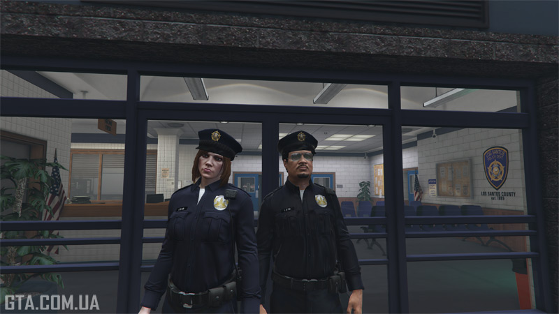 The color is different because one character (on the right) got caught in the rain, while the other (on the left) did not.