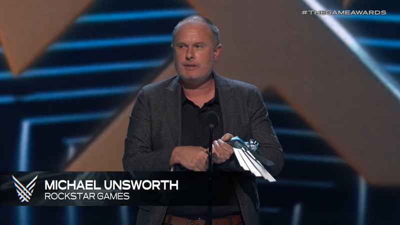 Майкл Ансворт на The Game Awards 2018 с призом «Лучший сюжет» за RDR 2.